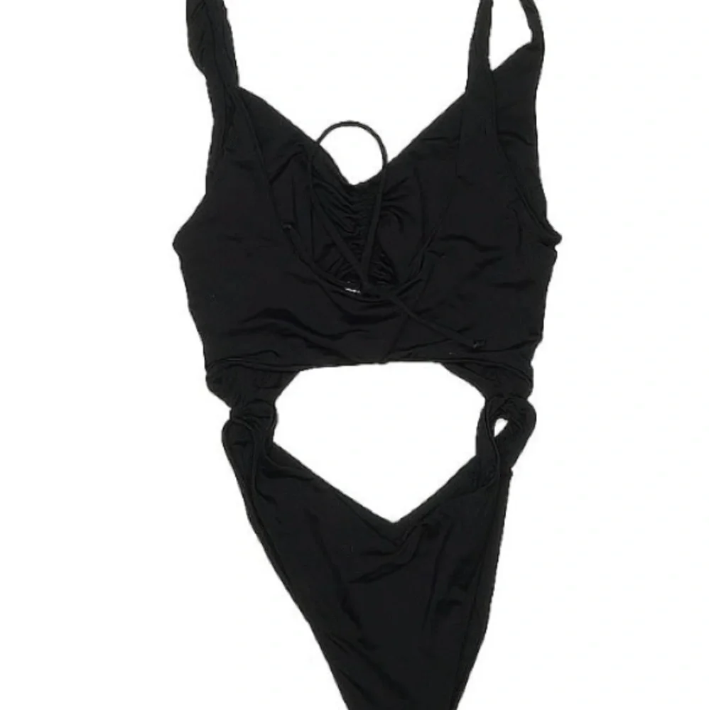 Frankie’s bikini sz medium. Monokini one piece w/cutouts. Adjustable coverage